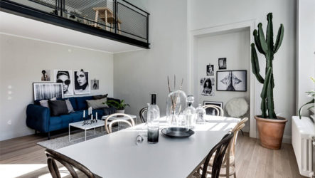 Conception de studio de style loft avec des éléments de style scandinave traditionnel